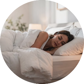A woman asleep in bed.